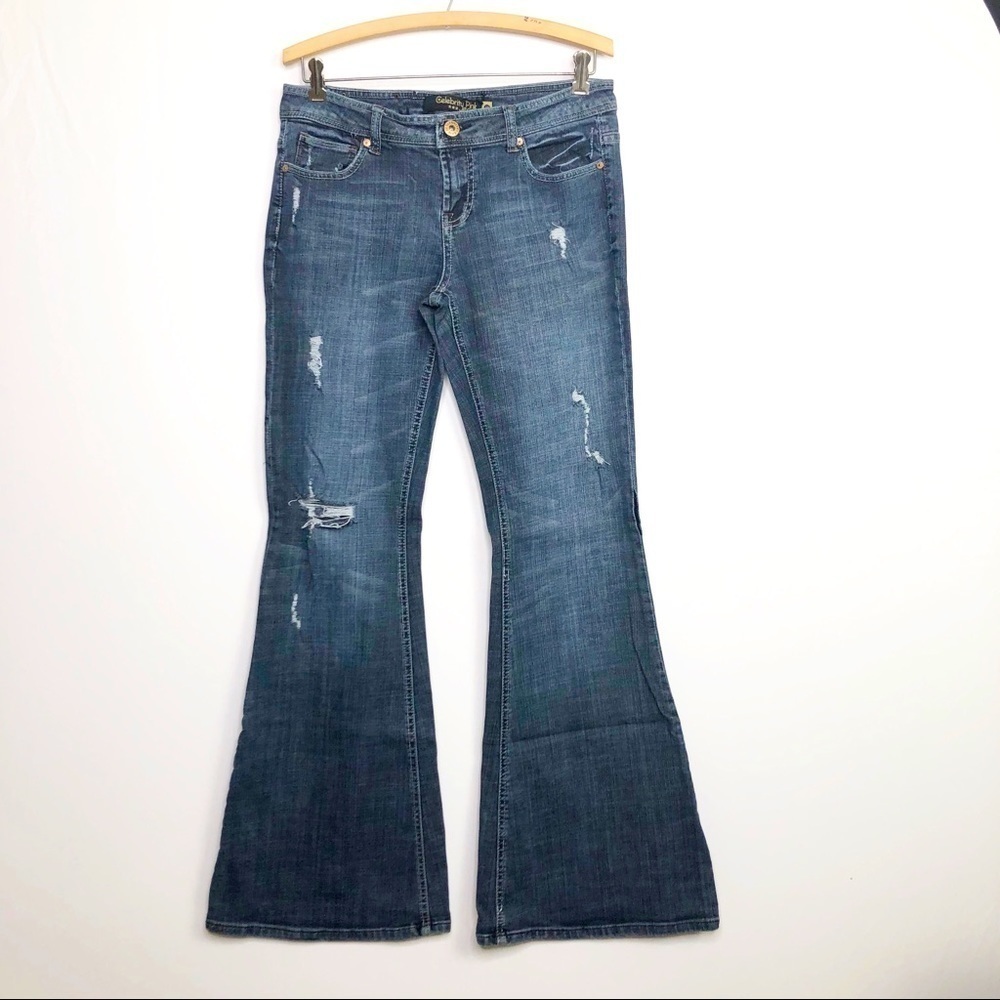 CELEBRITY pink distressed flared jeans
